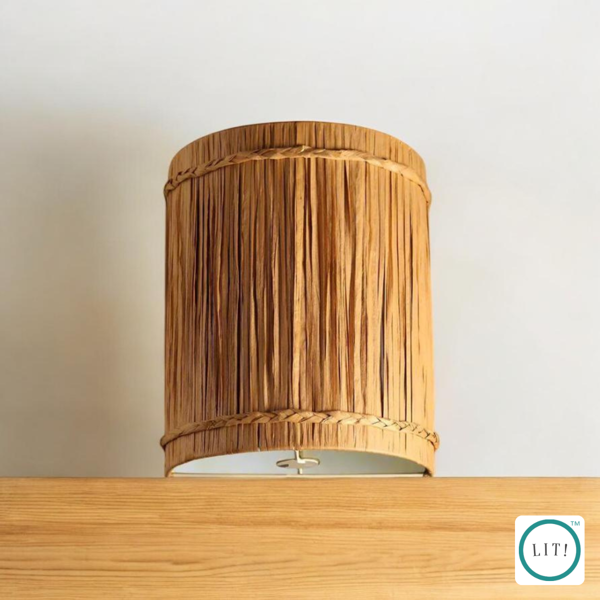 Handcrafted raffia cylinder lamp for warm ambiance