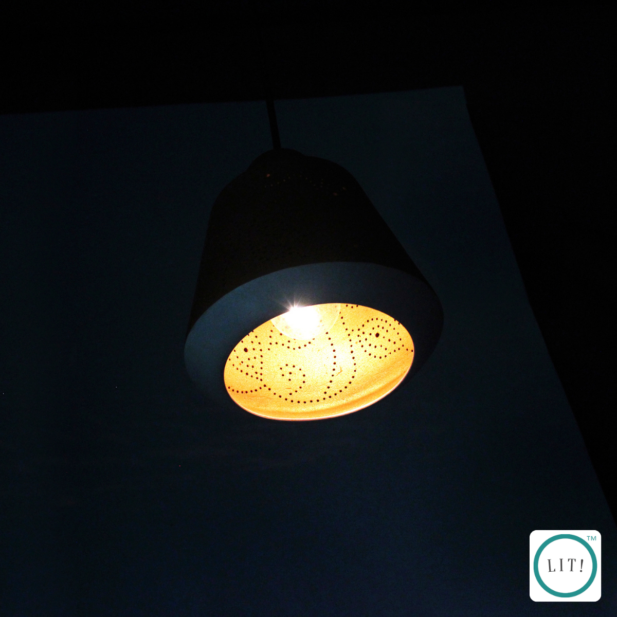 Handcrafted terracotta pendant with soft curves