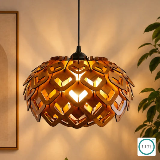 Tavira wooden pendant with layered petal silhouette suspended above a dining table