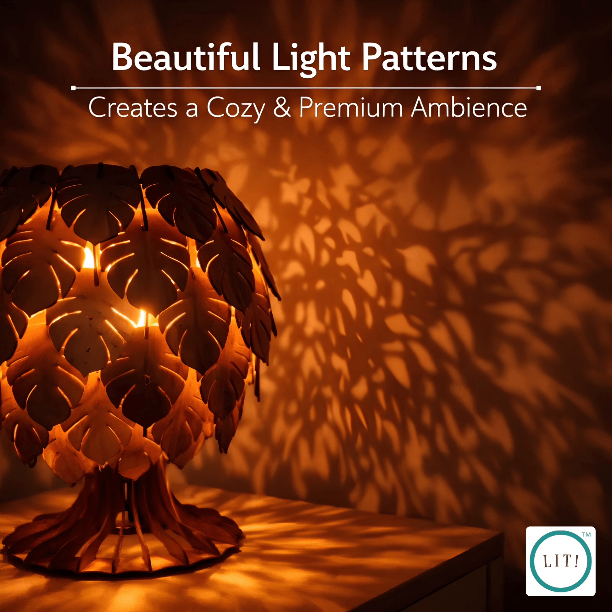 A decorative table lamp with a leaf-shaped shade glows warmly, casting intricate shadow patterns across a wall and tabletop. Text at the top reads 'Beautiful Light Patterns Creates a Cozy & Premium Ambience,' and a small 'LIT!' logo appears in the bottom right corner.